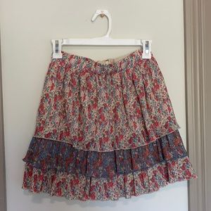 Small high waisted fancy skirt with built in pants.